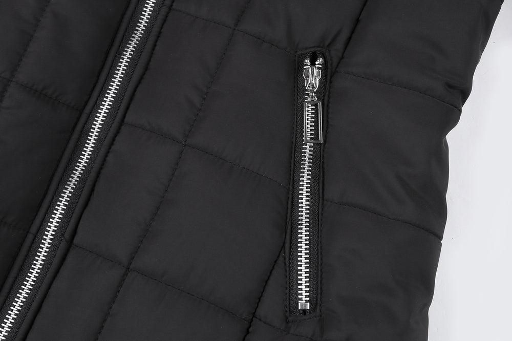 Close-up of a black puffer jacket with a zipper on a white background