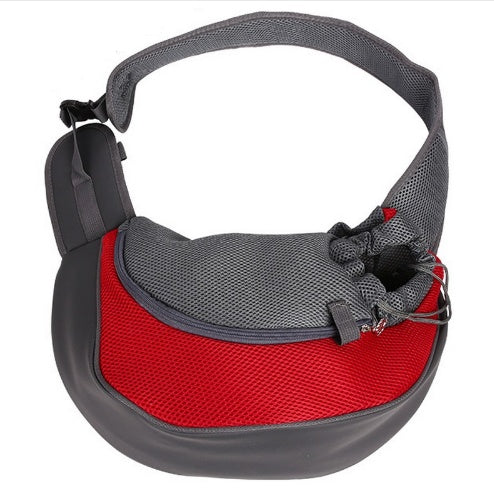 Red and gray pet carrier on a white background