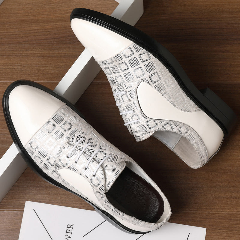 White sneakers with black soles on a wooden surface