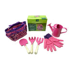 Children's gardening set with tools, gloves, and a watering can on a white background