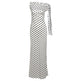 A white off-the-shoulder maxi dress with a black polka dot pattern and a long tie detail on one side, shown against a plain white background.