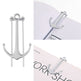 Silver anchor-shaped earrings on a white background