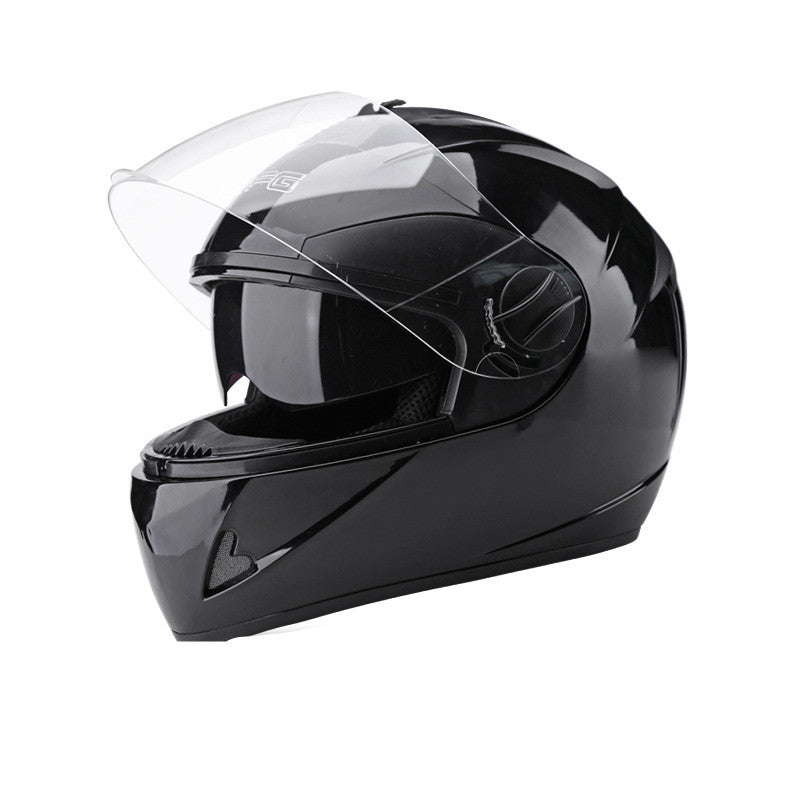 Black motorcycle helmet with clear visor on a white background