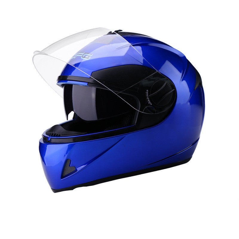 Blue motorcycle helmet with clear visor on a white background