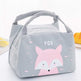 Gray lunch bag with a pink fox design on a white background