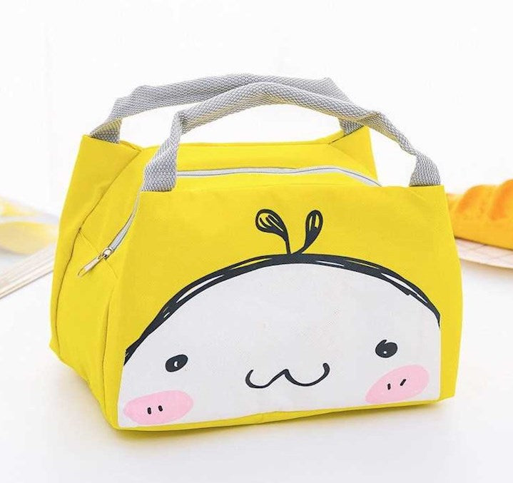 Yellow bag with a cartoon face design on a white background