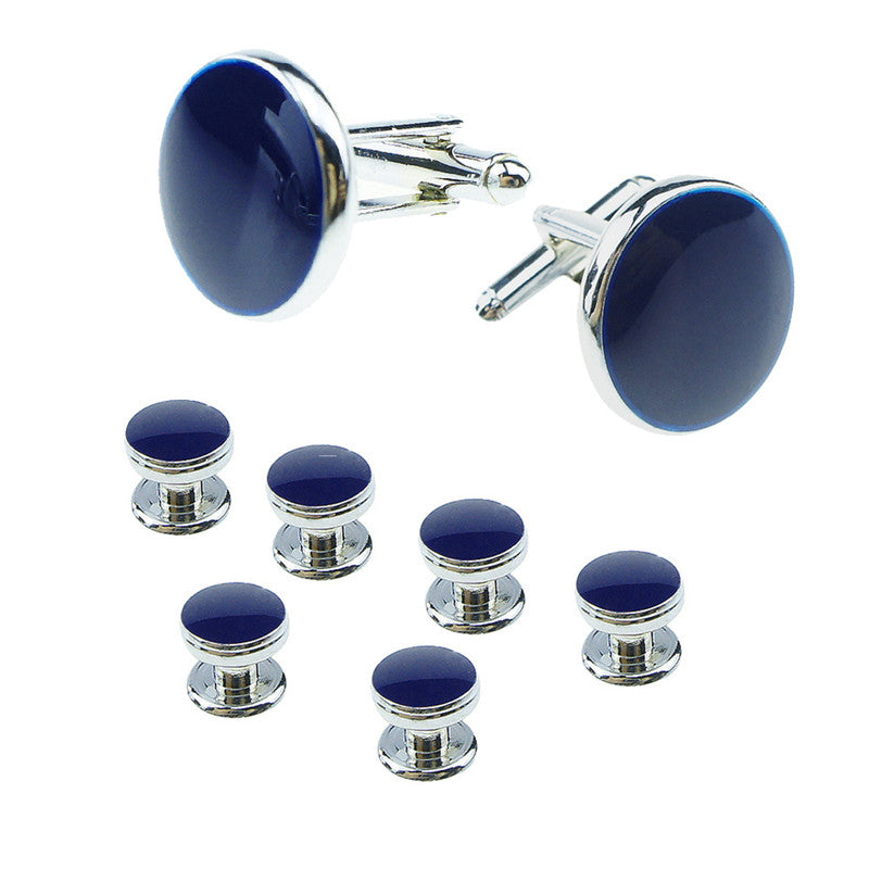 Set of blue cufflinks and matching buttons on a white background