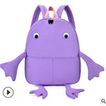Purple frog-shaped backpack on a white background