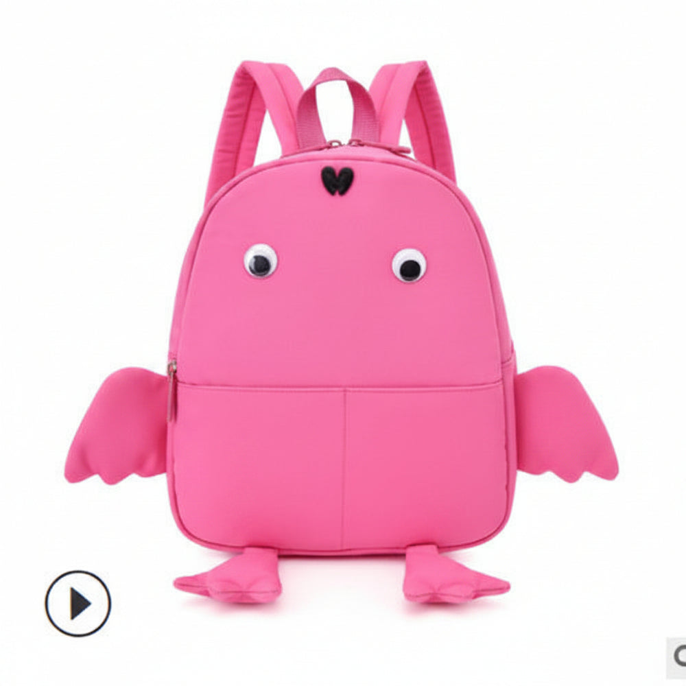 Pink backpack designed like a frog on a white background
