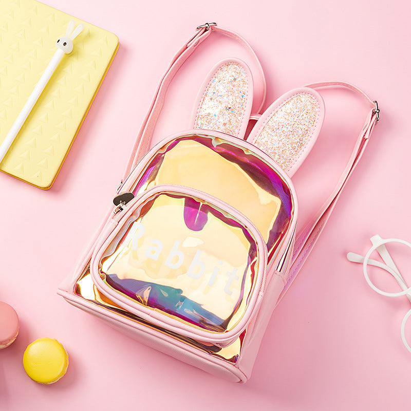 Pink backpack with bunny ears on a pink background