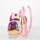 Pink backpack with a transparent front panel featuring a cartoon design on a white background