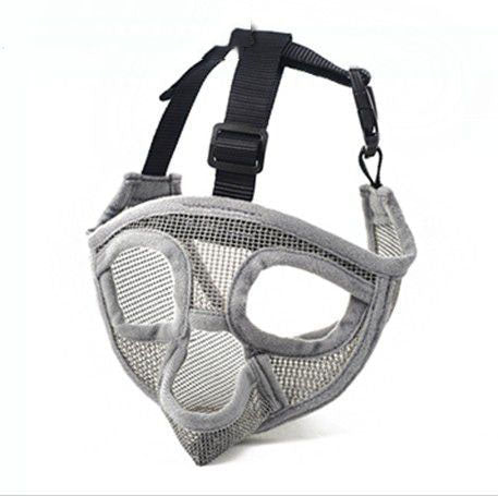 Gray mesh dog muzzle with black straps on a white background