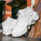 White high-top sneakers with roller wheels on a wooden floor.