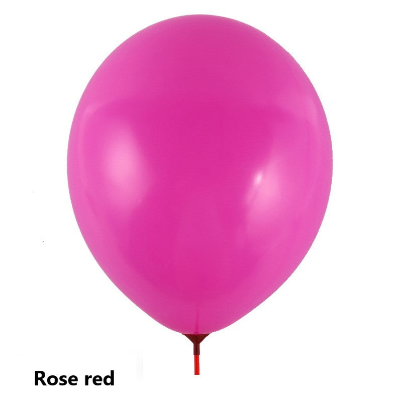 Rose red balloon on a white background