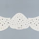 Mustache-shaped stencil with star patterns on a gray background