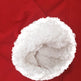Close-up of a white sherpa or faux-fur trim lining a red garment sleeve or cuff.
