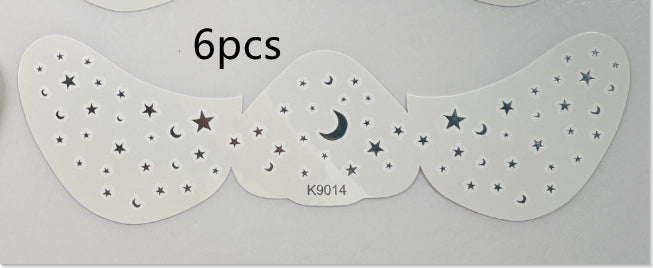Six star-shaped cutouts with moon and star patterns on a white background.
