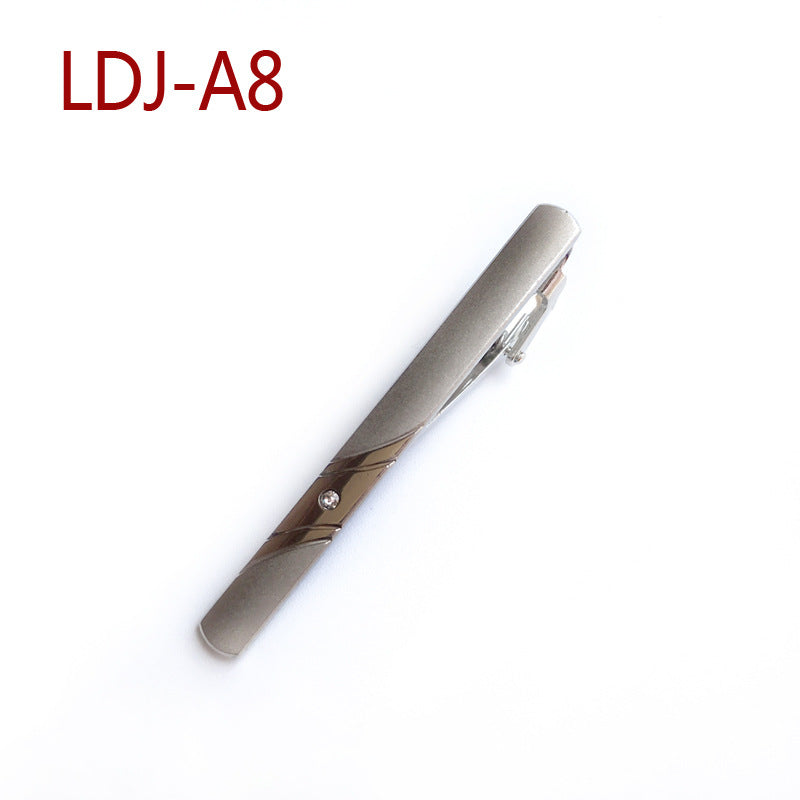 A metallic silver tie clip with diagonal gold-toned accents and a small clear rhinestone, shown on a plain white background with the text 'LDJ-A8' in red at the top left.
