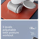 An infographic-style product presentation of a white and gray robotic abdominal massage device. The top half shows the device in use on a red mat with a digital display overlay, while the bottom half features a blue background with text reading '3 levels adjustable best posture workout' and a close-up of the handle.