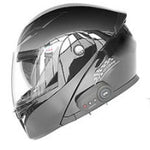 Black motorcycle helmet with visor on a white background
