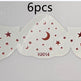 Set of six star and moon patterned eye patches on a white background