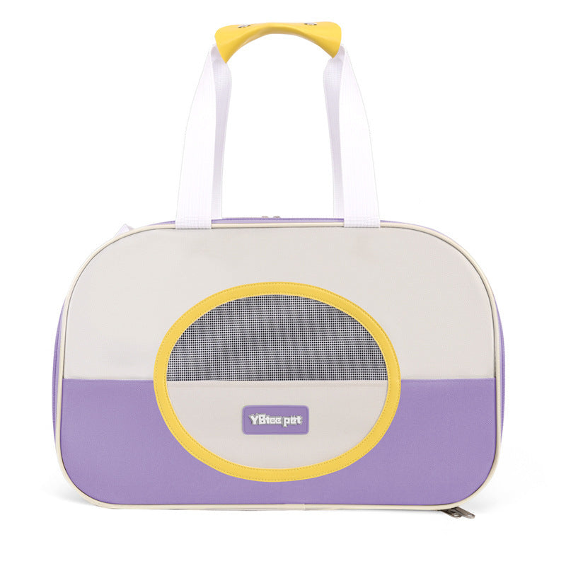 Pet carrier with purple and yellow design on a white background