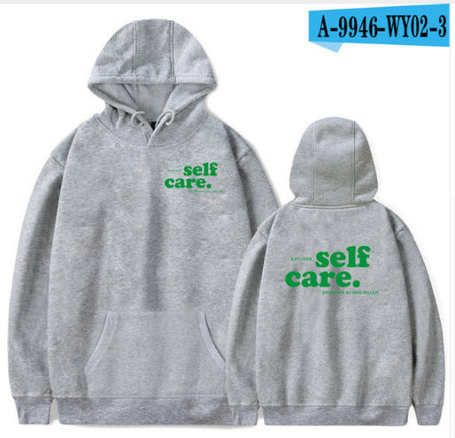 Gray hoodie with 'self care.' text on front and back, on a white background.