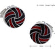 Pair of cufflinks with red and black design on a white background