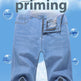 Light blue denim shorts with a special 'Self-priming' button closure design, shown against a light blue sky background with text overlays.