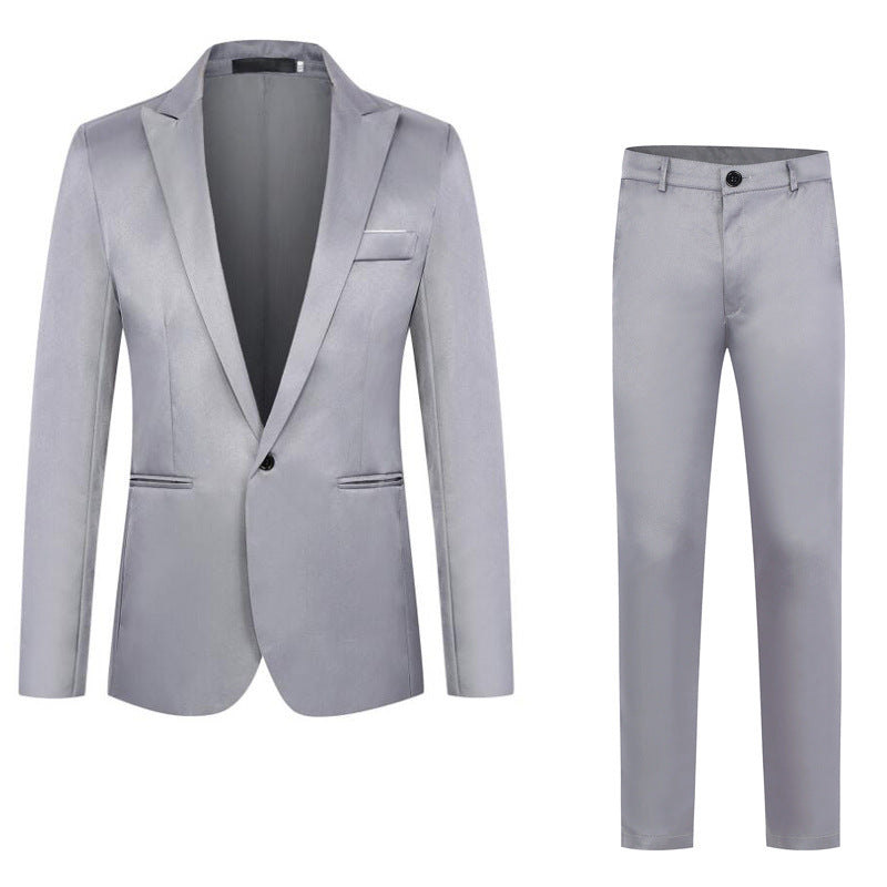 Gray suit jacket and pants on a white background