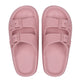 Pair of pink sandals with buckles on a white background