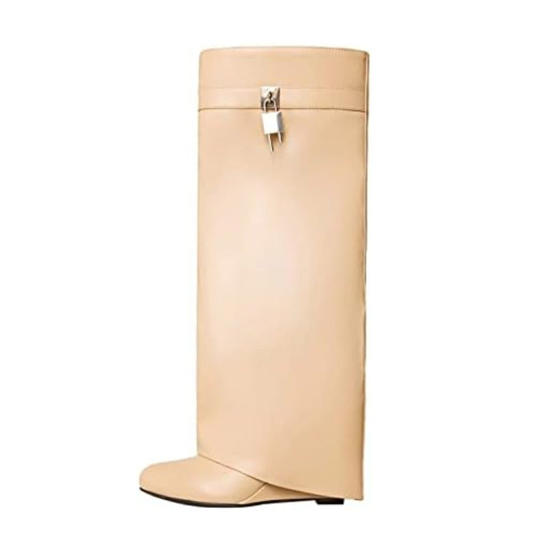 Beige knee-high boot with a silver buckle on a white background
