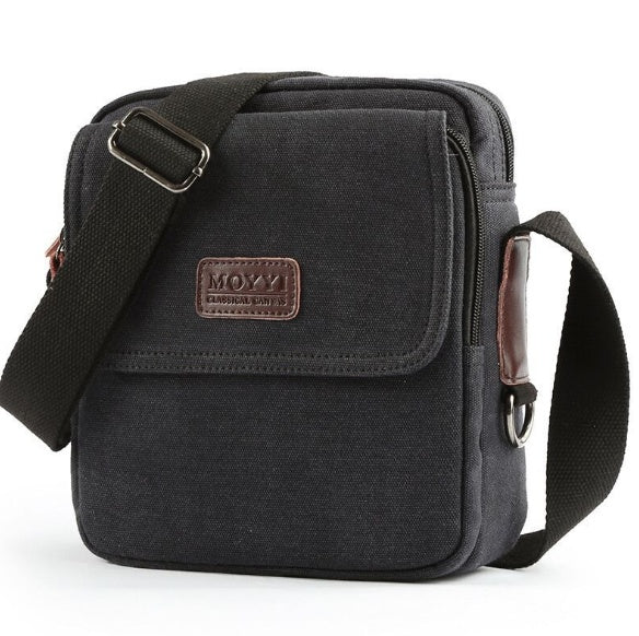 Black shoulder bag with a visible brand logo on a white background