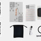A product kit laid out on a light gray background, including a black square receiver, a black drawstring pouch, a USB cable, a black ring, a booklet, an instruction sheet, and two QR codes with Chinese text. The booklet shows the brand name CORE RE.