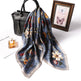 Floral scarf with a black handbag, perfume bottle, and framed picture on a white background Women's Decorative Silk-Style Square Scarf 70x70cm – 15 Prints Canada USA