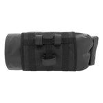Black roll-up bag with straps on a white background
