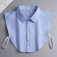 Blue shirt collar with buttons on a gray background