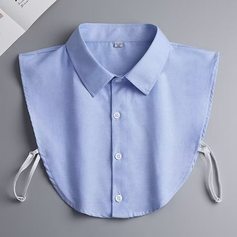 Blue shirt collar with buttons on a gray background