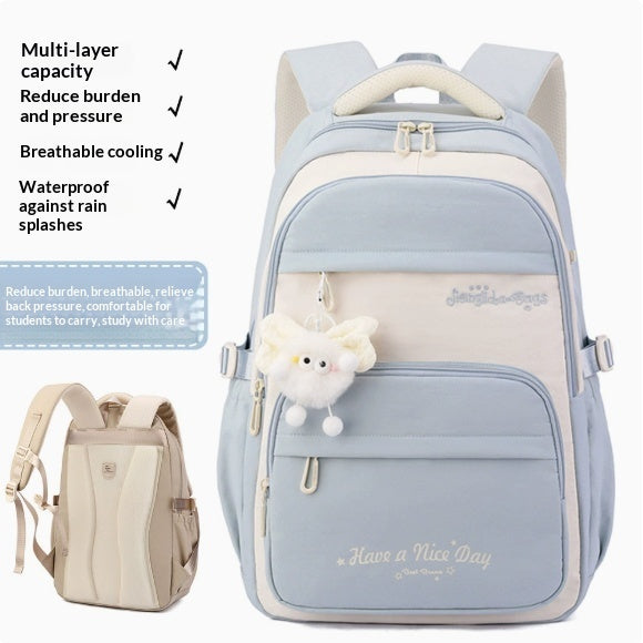A light blue and cream backpack shown on a white background with feature callouts in English and a smaller inset view of the same bag. The main backpack has a front zip pocket, top handle, shoulder straps, and a small plush cloud charm hanging from the zipper.