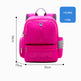 Pink backpack with measurements and weight information on a white background