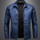 Blue jacket with black shirt on a gray background