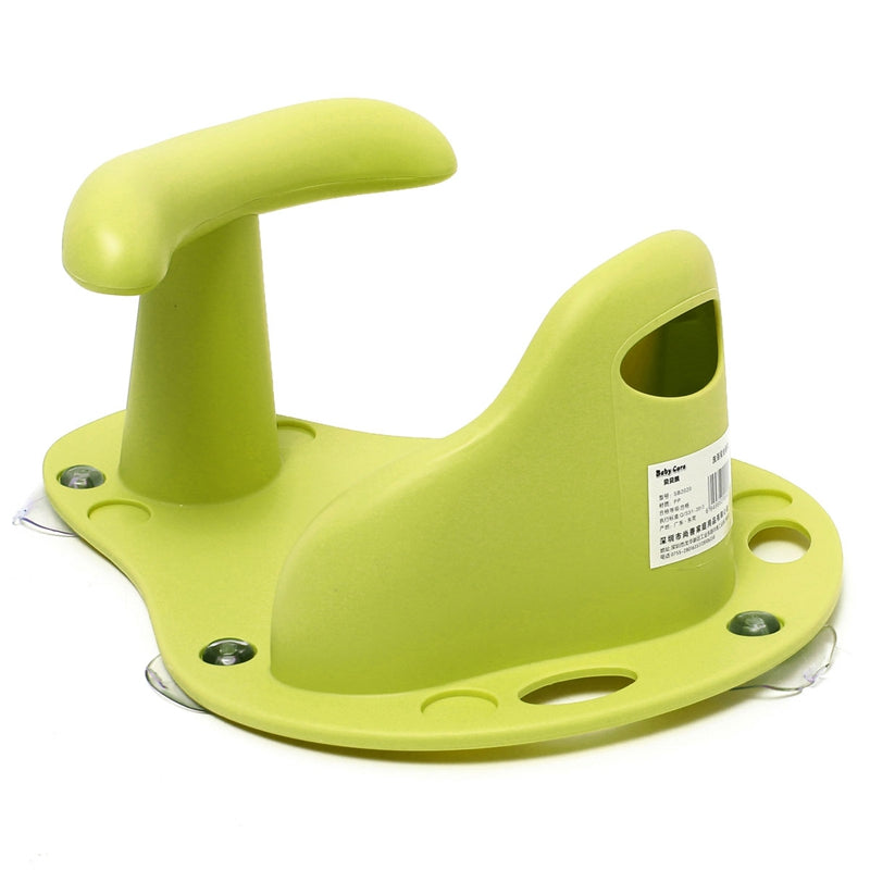 Green plastic tool with a handle on a white background