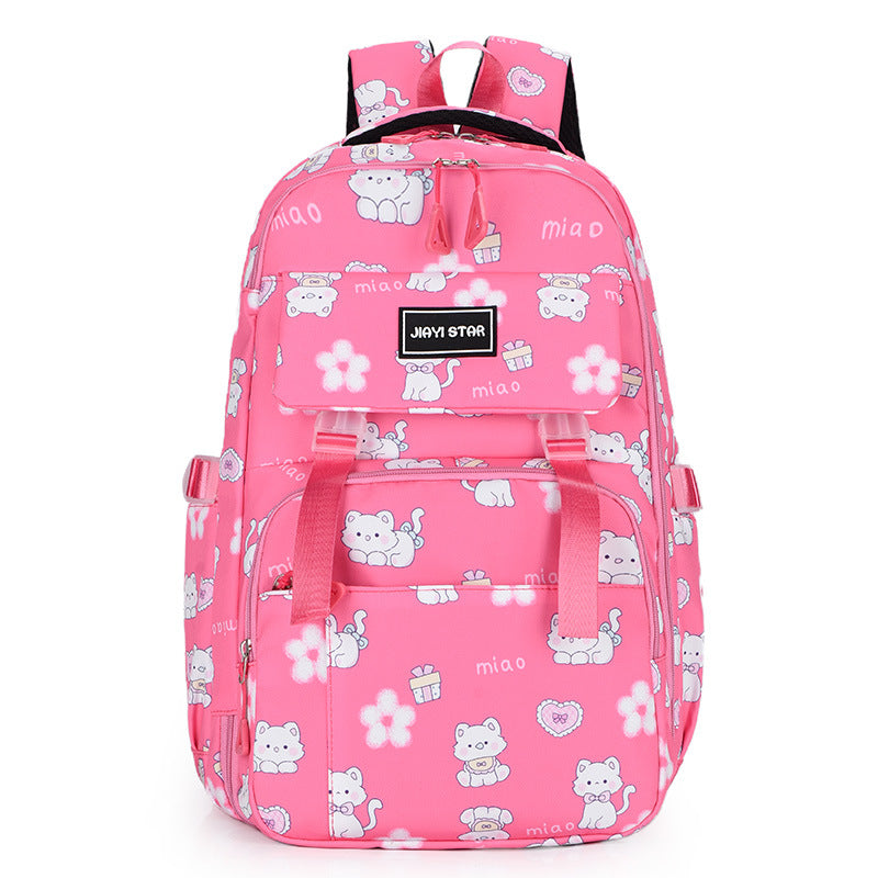 Pink backpack with cat and flower patterns on a white background