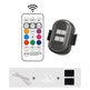 Remote control, light fixture, and USB cable on a white background