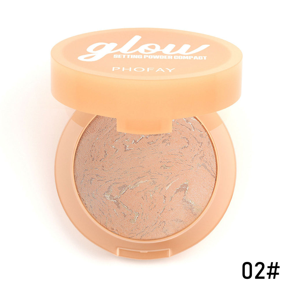 Poudre compacte avec un couvercle couleur pêche étiqueté 'glow' sur un fond blanc
