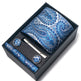 Blue paisley tie set with tie clip and cufflinks in a black box on a white background