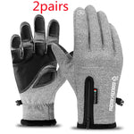 Two pairs of gray gloves with black accents on a white background
