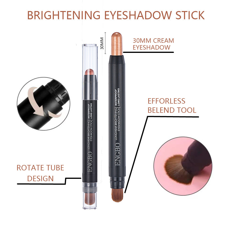 Brightening eyeshadow stick with blend tool on a white background