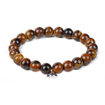 Brown beaded bracelet on a white background