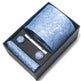 Blue patterned tie set with tie clip and cufflinks in a black box on a white background